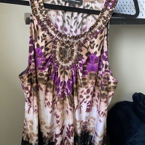 Top beautiful beaded accent through neckline.